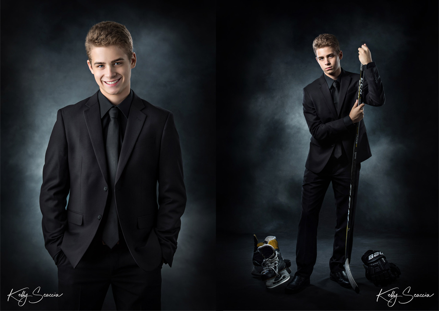 High School senior guy studio portrait in a black suit with a hockey stick and skates